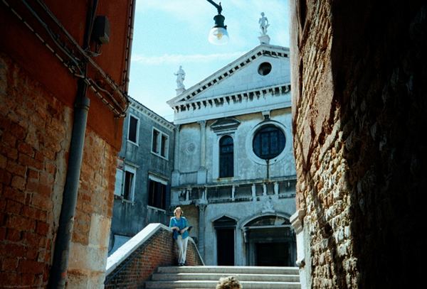 Faith Tame standing on the bridge